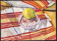Lemon in dish on striped orange cloth 26x36cm
